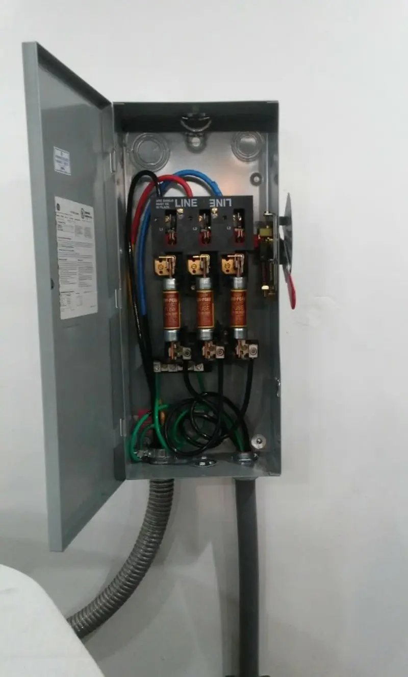 Three-phase disconnect switch installed for Smoke Detector Installation in Latimer